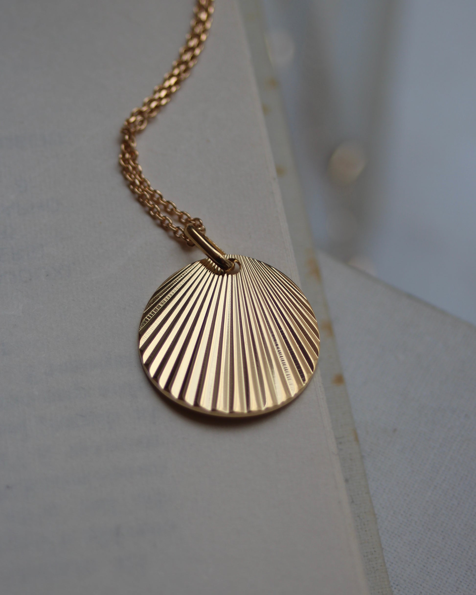 Pendentif rayonnant