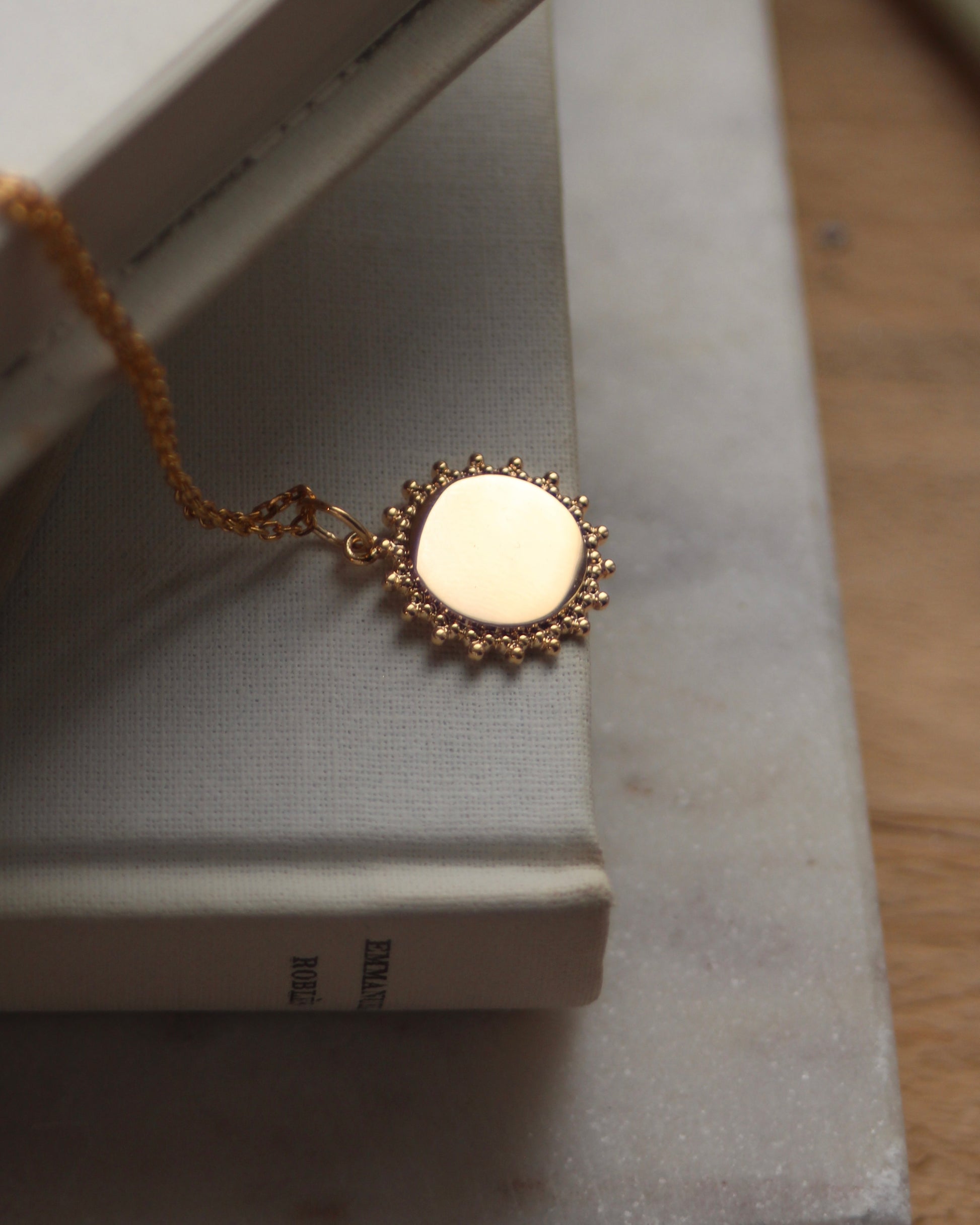 Médaille soleil