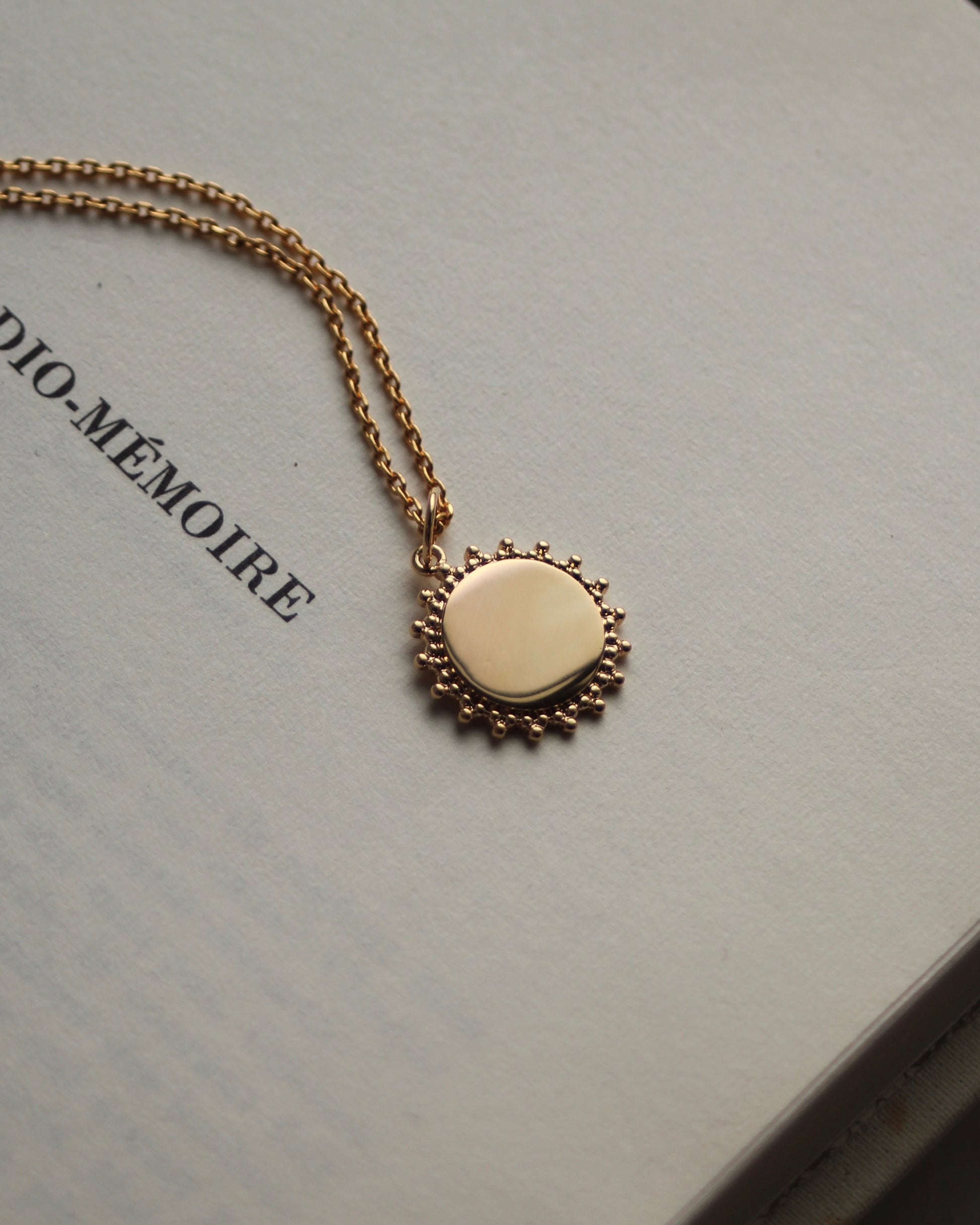 Médaille soleil